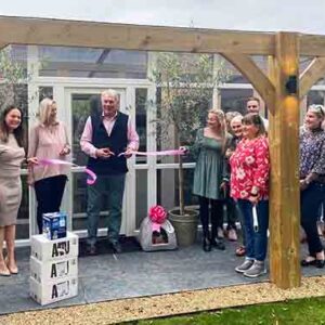 Councillor John Griffiths MBE cuts ribbon Longcroft Bury St Edmunds Grand Opening
