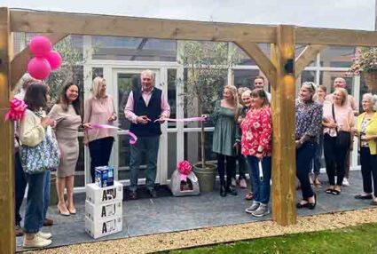 Councillor John Griffiths MBE cuts ribbon Longcroft Bury St Edmunds Grand Opening